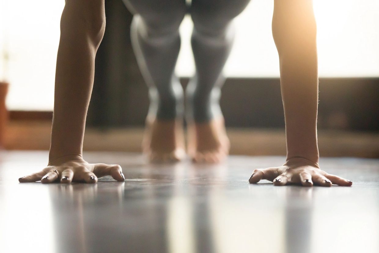 yoga position plank showing hands and feet