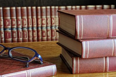 Legal books and a pair of glasses