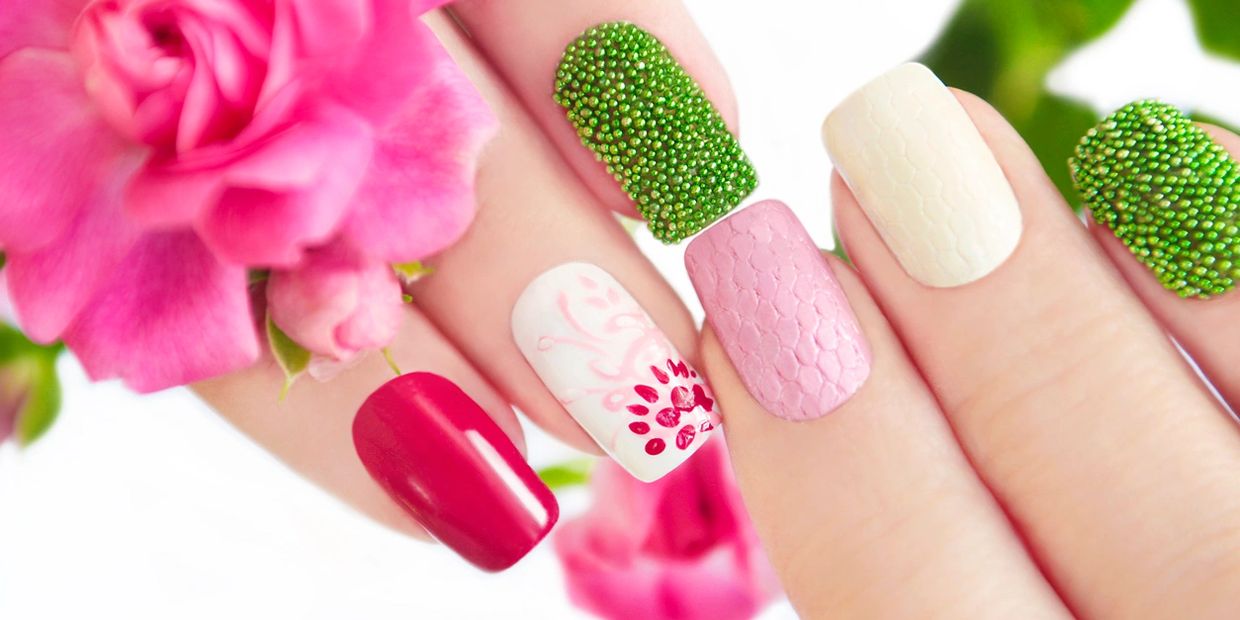 Colorful and textured floral nail art with a pink rose.