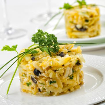 Elegant savory rice dish garnished with herbs.