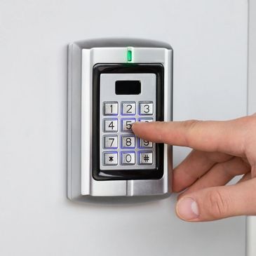 Person dialing a basic intercom/integrated access system