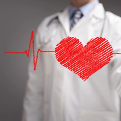 Doctor with heart and heartbeat line illustration symbolizing heart health.