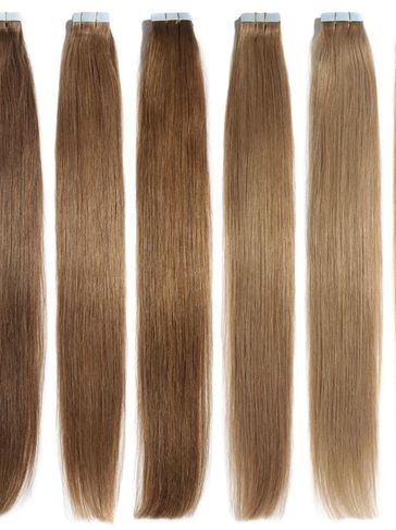 Various shades of long, straight hair extensions.