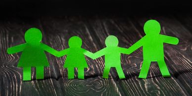 image cutout of a family holding hands representing need for Family Law services