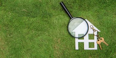 keys to your new home on green grass.