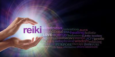 Hands radiating healing energy with Reiki-related words glowing.