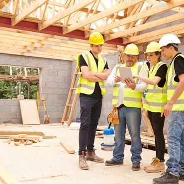 Brief meeting of Special Deputy Inspectors at a construction site with engineer discussing items rea