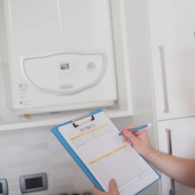 Man servicing a boiler