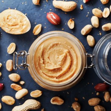 Nuts and a jar of peanut butter