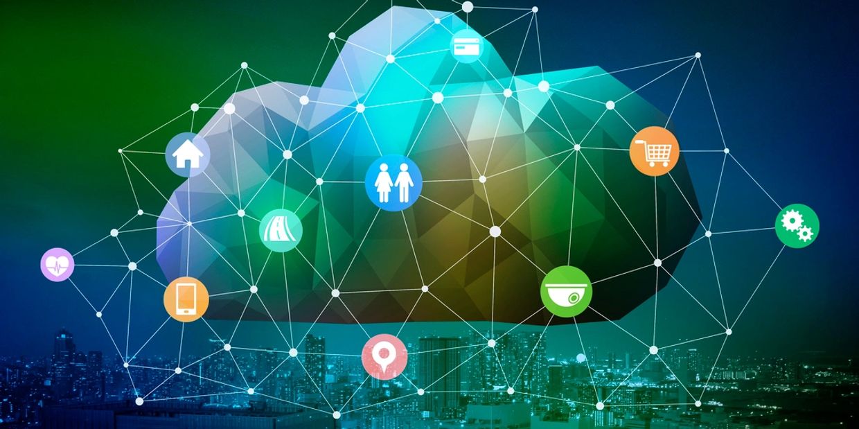 Abstract cloud network with interconnected icons over a cityscape at night.
