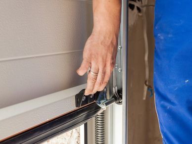 Garage Door Service Technician working 