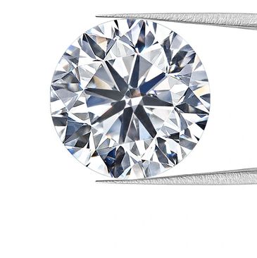 Close-up of a round diamond held by tweezers.