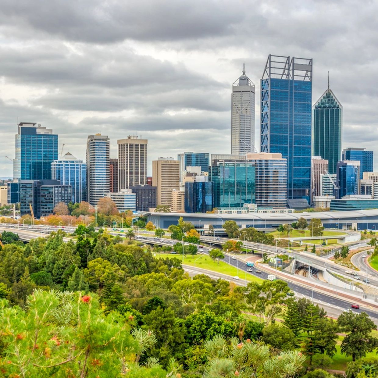 Picture of a Perth CBD from a distance showing the parks surrounding the city and the city itself