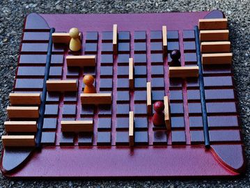 Wooden square board with positioning elements