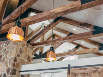 Hanging light fixtures installed in vaulted ceiling