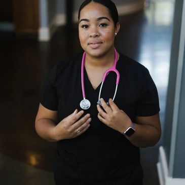 A picture of a nurse with pink stethoscope