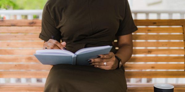 Student working in a notebook