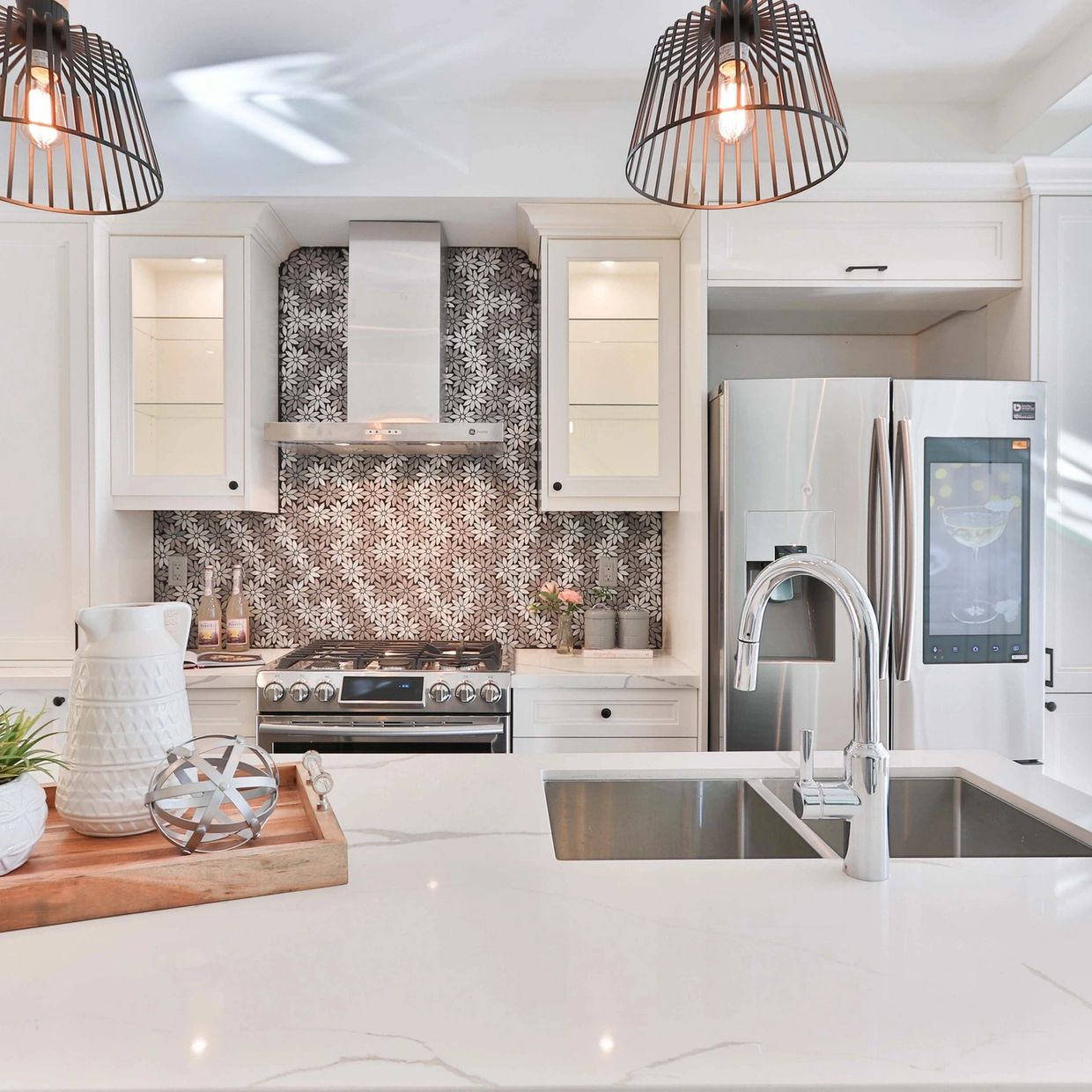 Modern yet rustic kitchen remodel featuring solid surface countertops, integrated sink,& fixtures 