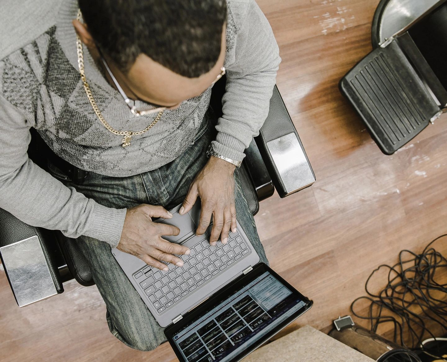 Man typing on laptop