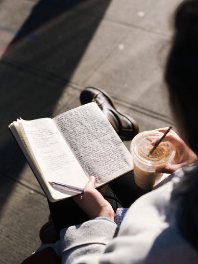 A person selects categories for the Regal Summit Literary Book Awards