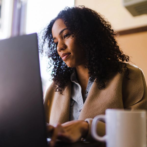 A woman working on her laptop