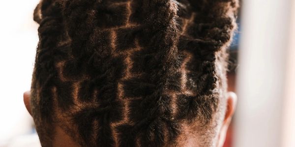 man with locs done by herbalist blends in Roswell Georgia