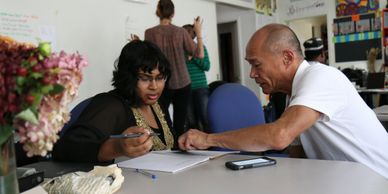 A picture of a woman writing something important