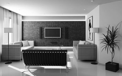 Modern monochrome living room with sleek furniture and minimalist design.