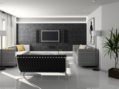 Modern living room with monochrome decor and sleek furniture.