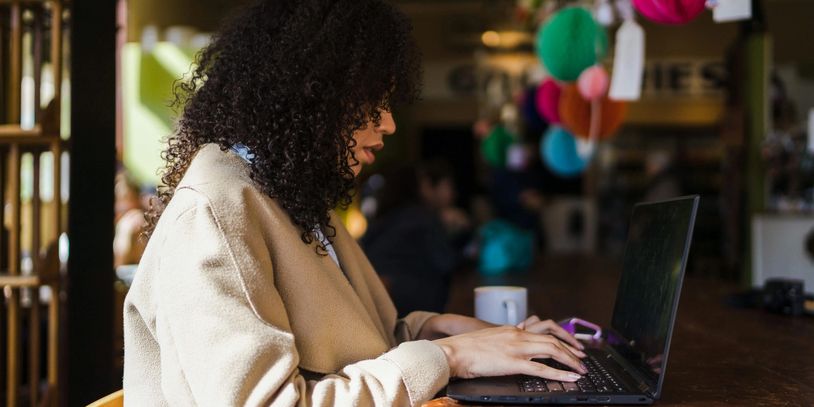 Personnel working on computer