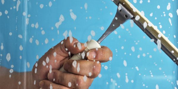 A man washing windows.