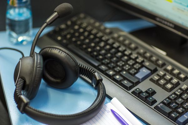 Headset on computer keyboard