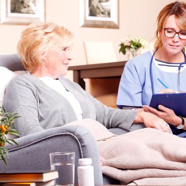 Caregiver assessing a resident.