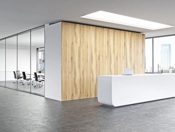 view of windows surrounding conference room inside modern office