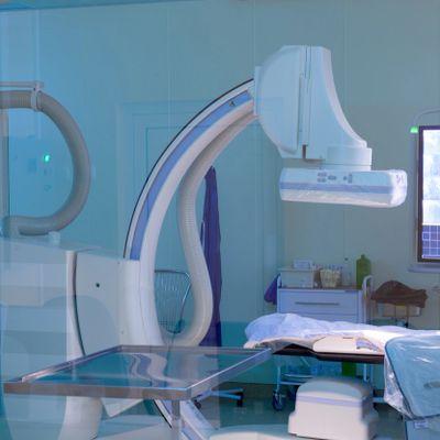 Modern medical imaging equipment in a clinical room.