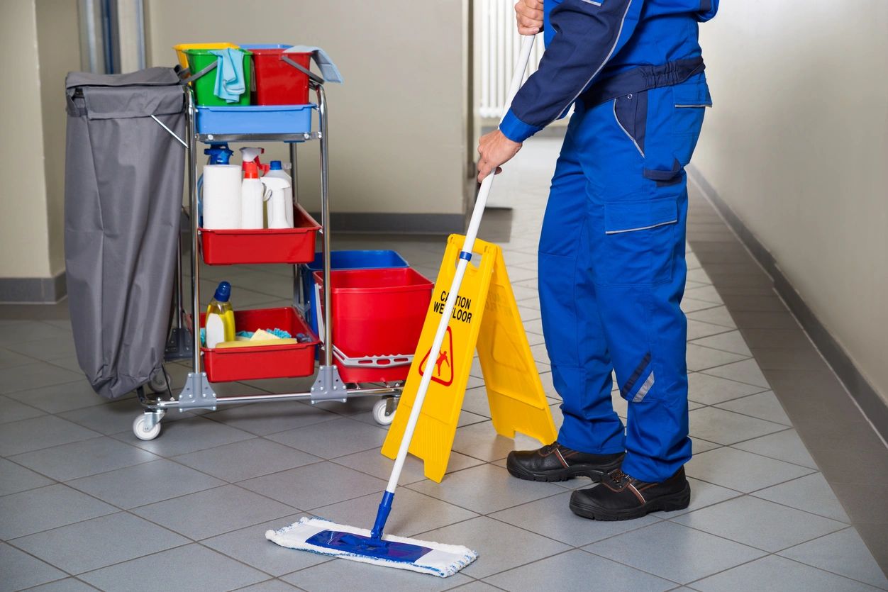 Cleaner conducting a commercial cleaning