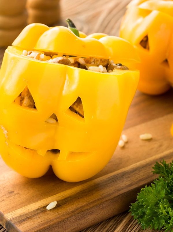 Bell peppers carved with smiling faces