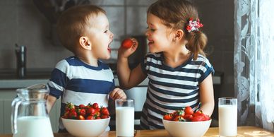 Sharing strawberries
