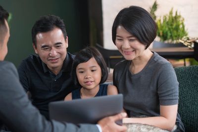 young Asian family in a meeting