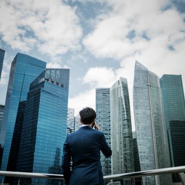 businessman wearing a suit and talking on the phone