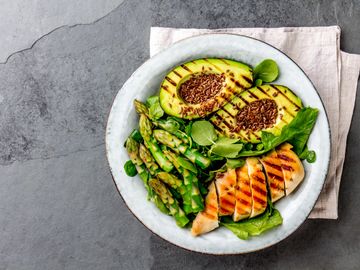 Salad with Avocado and grilled salmon