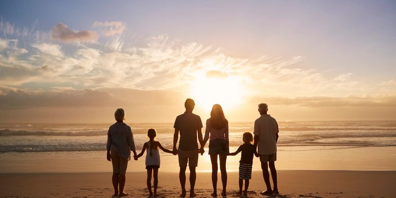 Family standing on the beach holding hands. Parents, Teenagers, Pre-teens, family therapy counseling