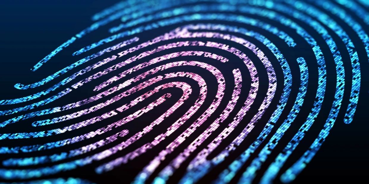 Close up of blue and pink digital pixelated fingerprint