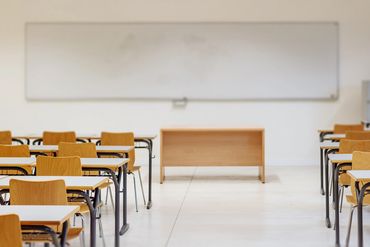 empty classroom with large whiteboard