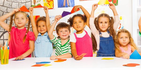 Kids showing their activity at the child care center