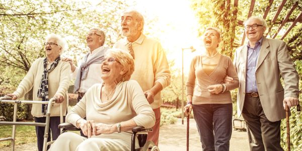 Nursing home partners, laughing together.