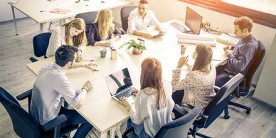 Customer discussing software project in a meeting room