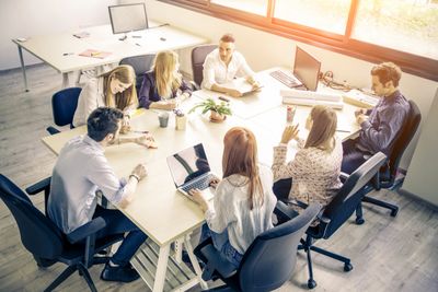 Group of people discussing issues at a table