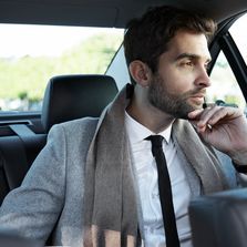 Globa Passenger riding in a chauffeured driven car to a Sydney location.