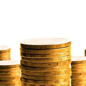 Stacks of gold coins on a white background.